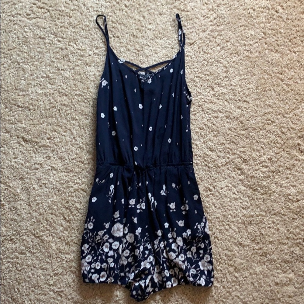 navy blue floral pattern romper from garage